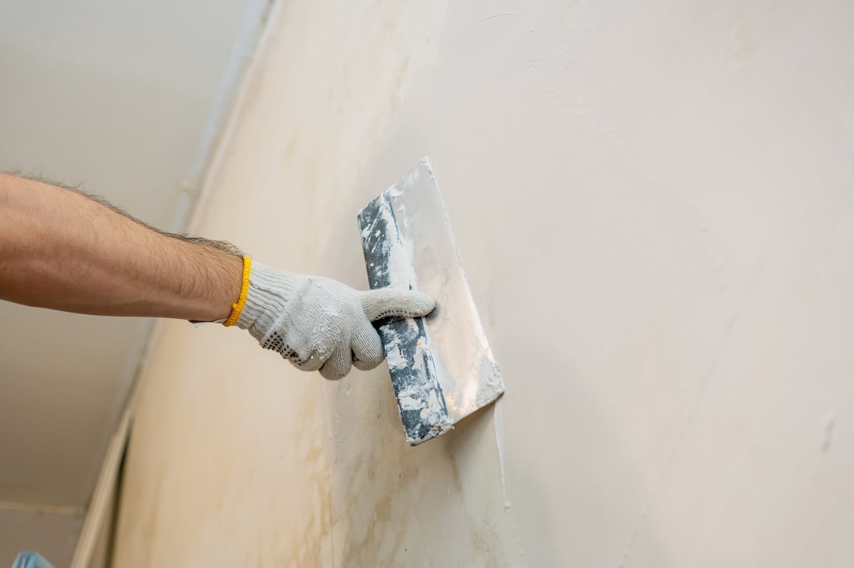Drywall repair and surface prep — pre-paint preparation work